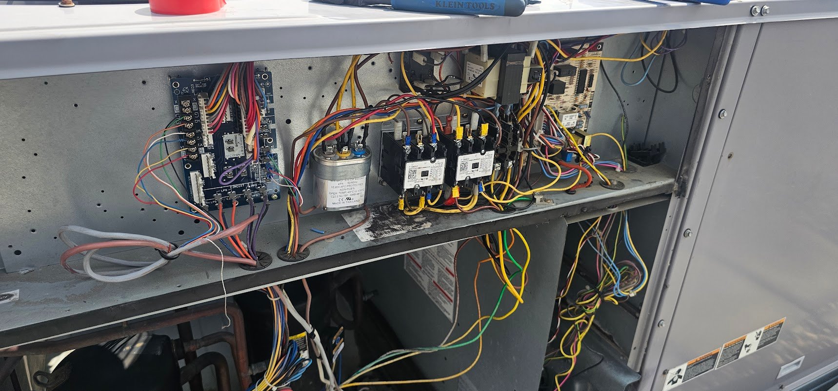 Commercial HVAC units on a rooftop.