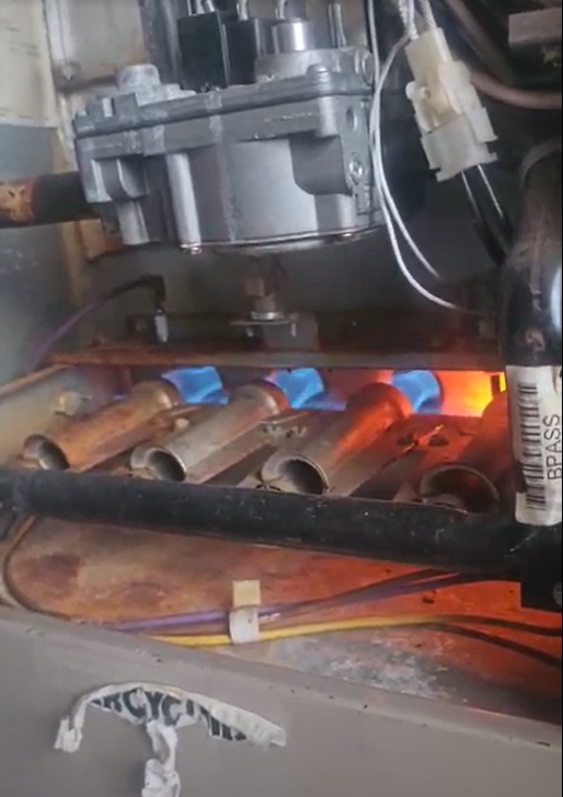 A furnace in a home basement.